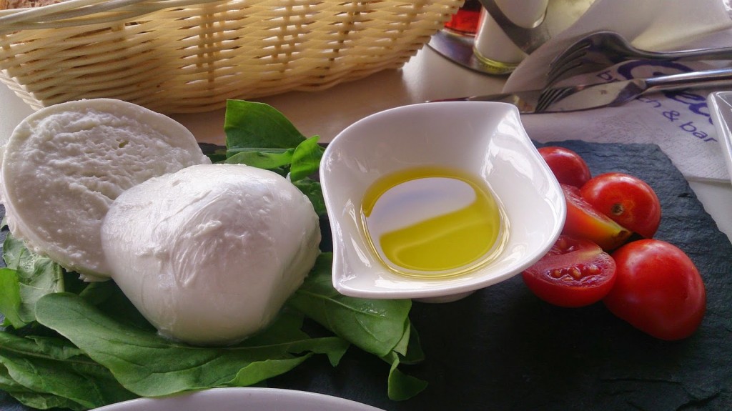 Bufala mozzarella with olive oil, basil and tomatoes