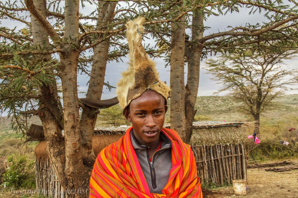 Maasai Warrior with headgear made using the mane of the lion that he hunted
