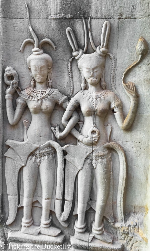 Apsaras with their fancy hairdos, jewelry and dresses